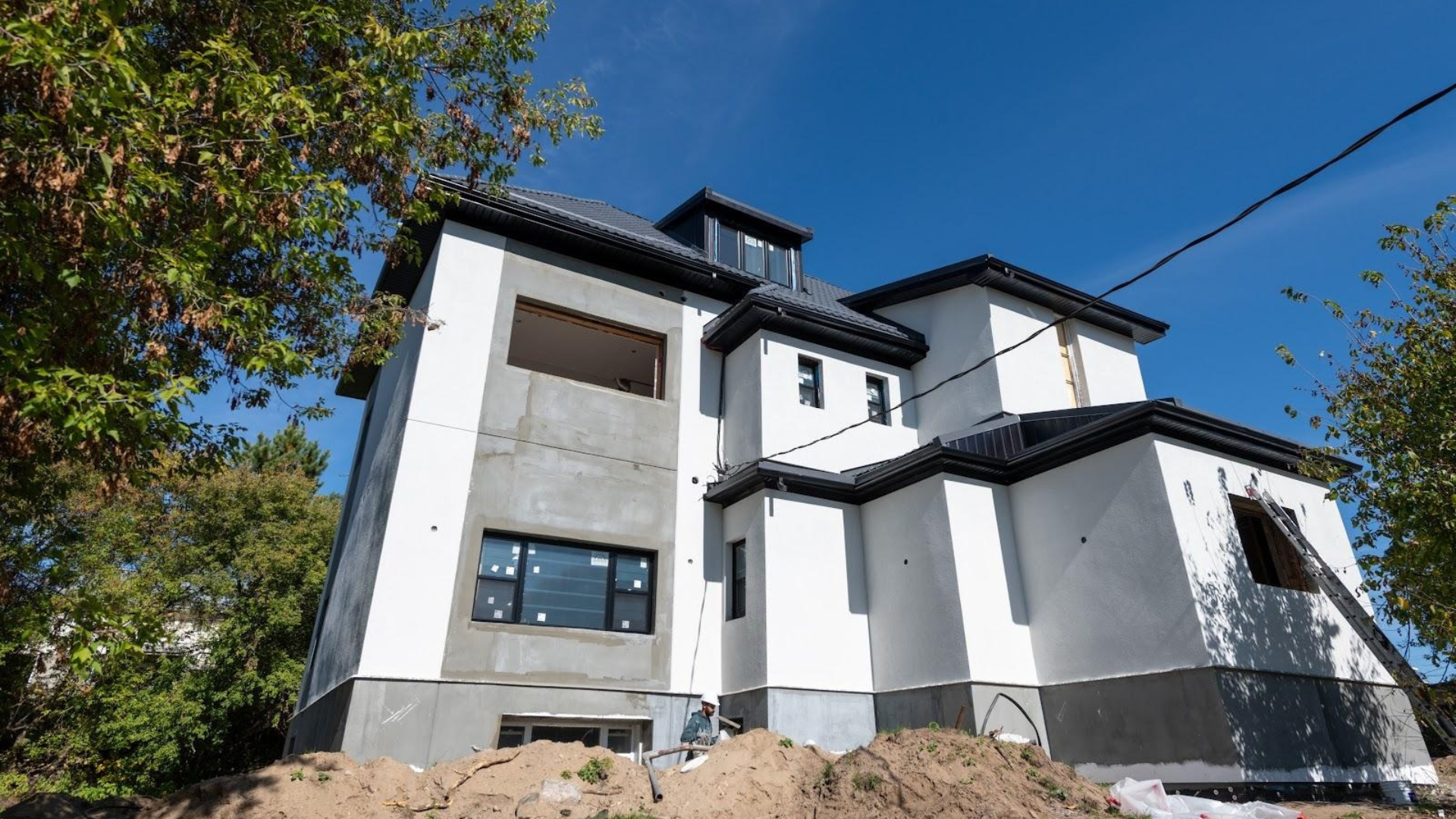 Construction site logistics with workers and equipment